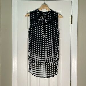 XOXO high-low sleeveless work shirt